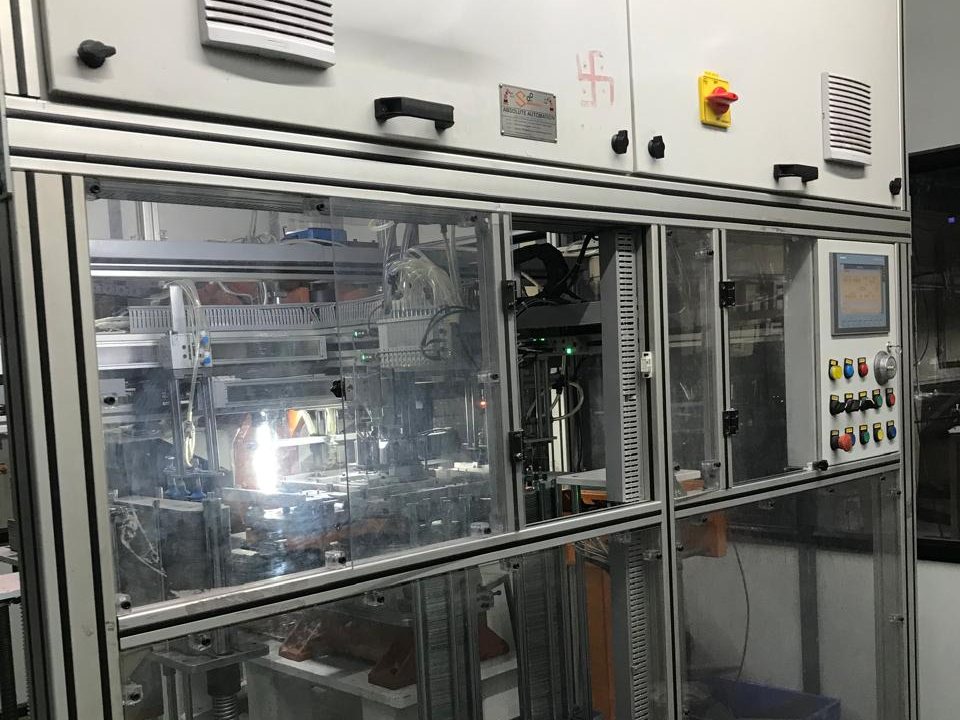 Fully automatic ceiling fan blade riveting machine built by SC Innovators, guards closed